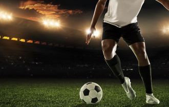 Guy dribbling with a ball