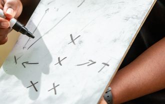 Players press to win the ball in midfield