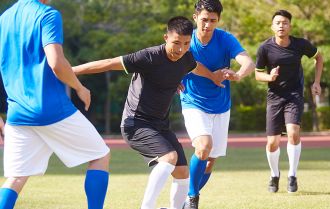 Defender moves to cover team mate