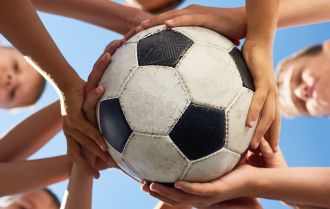 Players keep the ball under pressure