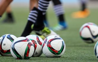 Players combine to score a goal