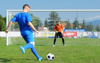 The joker game, player shooting at goal